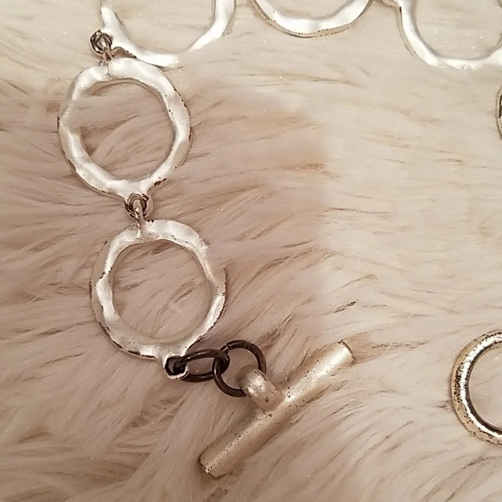 Kenneth Cole silvertone circle toggle bracelet
